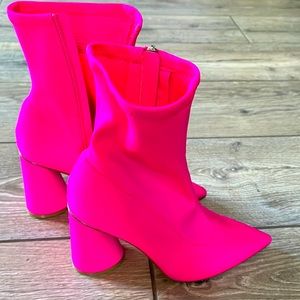 Bright beautiful, hot pink ankle booties.